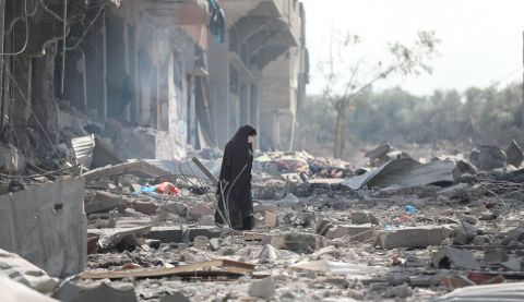 A woman resident of Gaza City searches the rubble for belongings in the aftermath of bombing by the Israeli army. 10th October 23