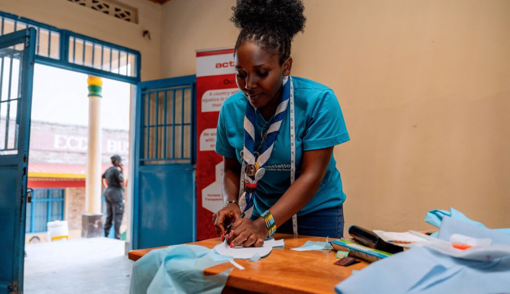 Belyne, a workshop leader at the Girls camp leads sessions on how to make reusable period pads. 