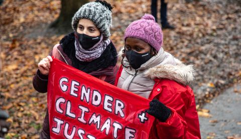 ActionAid's climate justice activists Monicah and Safa at the Global Day of Action for Climate Justice.