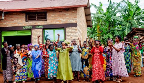 Women farmers in Rwanda celebrating their achievements through the Improving Food Security Project. Gifts in Wills funds vital projects like these, allowing women to create long term sustainable changes to support their families and communities.