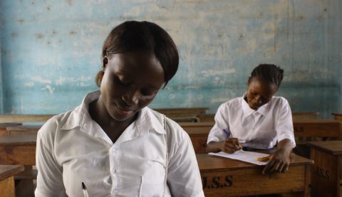 Sia (left), 19, was one of 25 girls in her school to receive a scholarship to help her stay in education