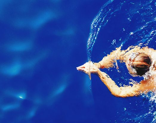 woman swimming in a pool