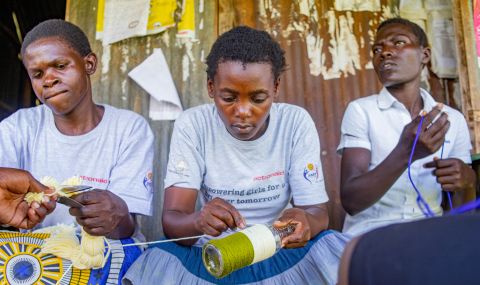 Out-of-school girls being trained in handicraft skills by members of the Nyarongi Women’s Network in Homabay county, Kenya.