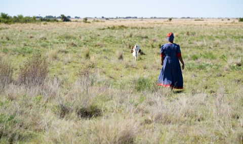 Woman walking away from camera