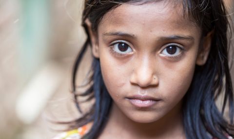 Poroshmoni, 8, lives in the slums of Dhaka