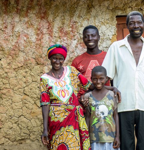 Scholastique (left) has received farming training from ActionAid, benefitting her whole family.