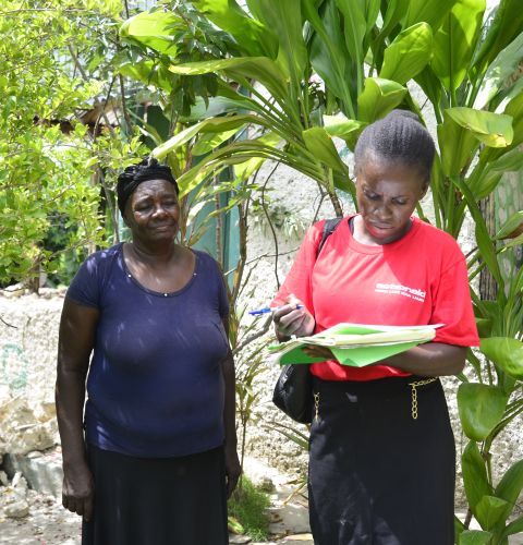 woman with clipboard doing needs assessment