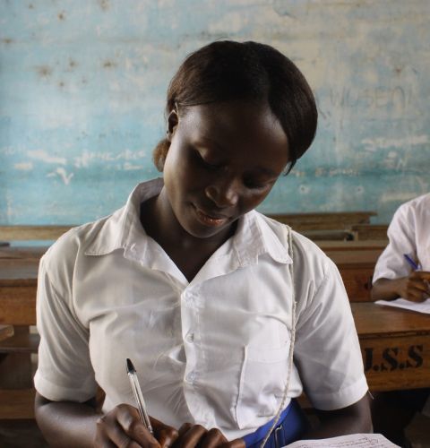 Sia (left), 19, was one of 25 girls in her school to receive a scholarship to help her stay in education