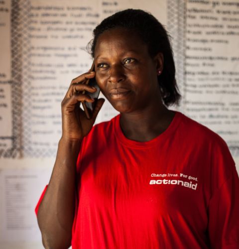 Josephine Charo helps run a helpline for survivors of violence in Kilifi county, Kenya, with support from ActionAid