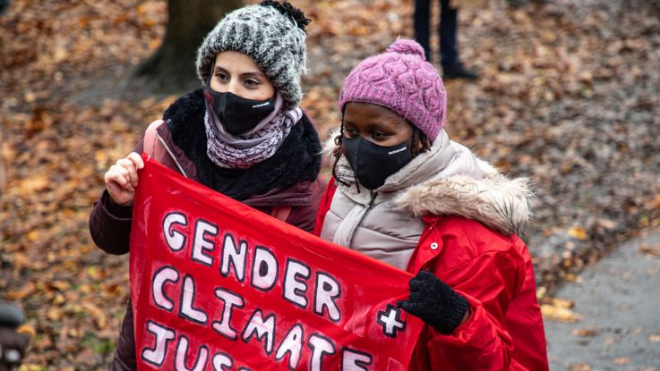 ActionAid's climate justice activists Monicah and Safa at the Global Day of Action for Climate Justice.