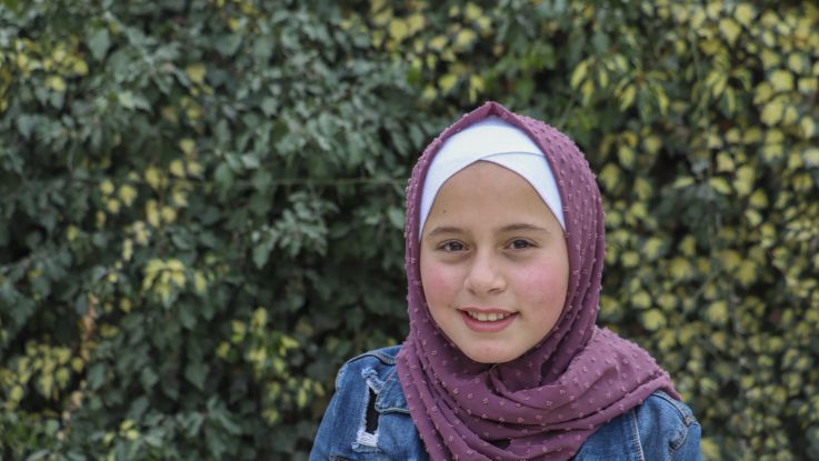 Since the earthquake, Jumana, 11, has been unable to attend school. One day, Jumana wishes to become a doctor to help the children who were trapped under the rubble caused by the earthquake.