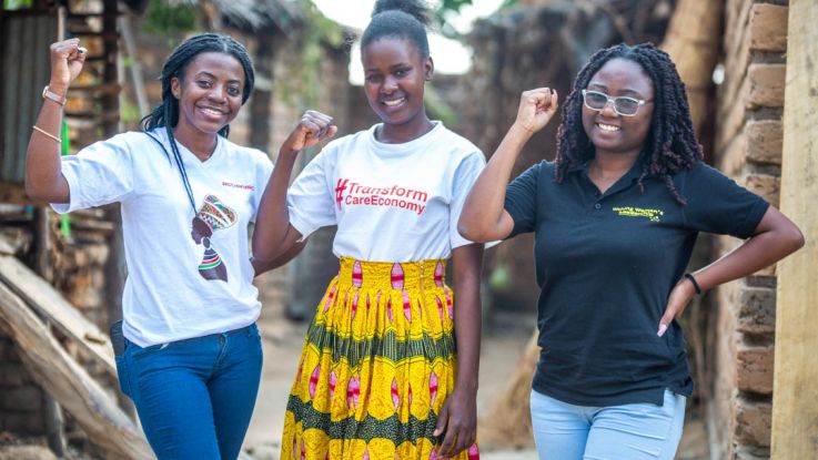 Eneless Hudson (centre), 25, is challenging austerity measures through the Mchinji Young Women Hub in Malawi.