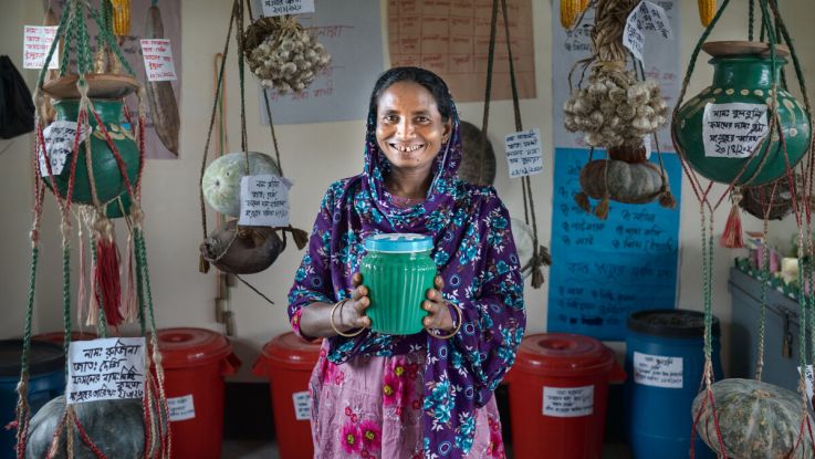 Gulshanara, 45, farmer, grandmother and president of women farmers' group with husband Noab