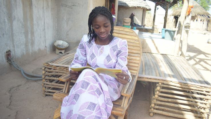 Girl reading her book