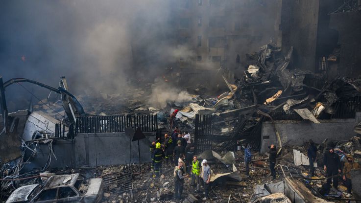 Emergency services looking for people in the rubble. 