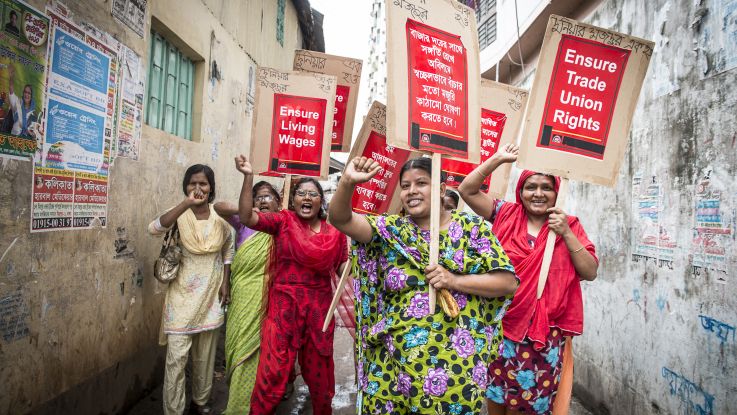 Garment workers supported by ActionAid campaigning for respect of labour laws in Bangladesh.