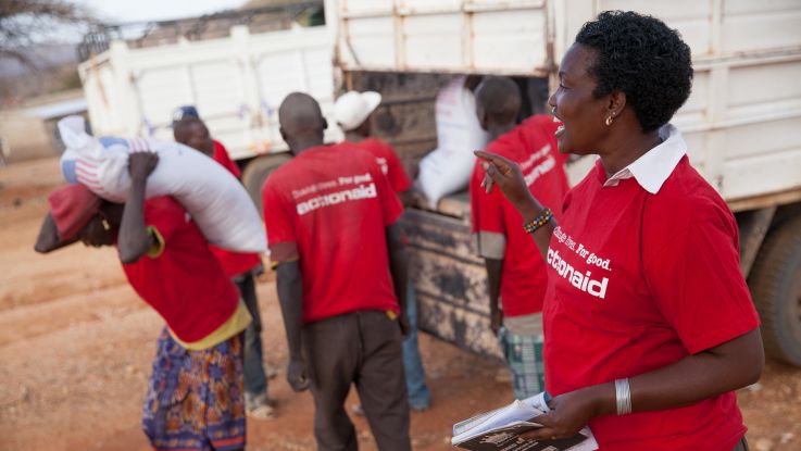 Woman leader Luijah directs an ActionAid food distribution for people suffering from drought in Kenya