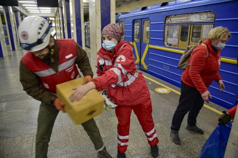 Ukrainian Red Cross staff and volunteers are providing food and other basic necessities to about about 8,000 people who are sheltering in a subway station in Kyiv