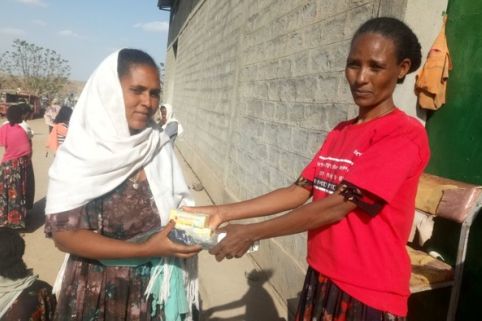 woman receiving a kit