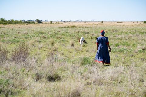 Woman walking away from camera