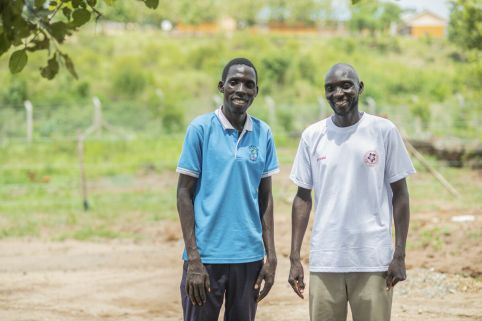 Men posing for camera